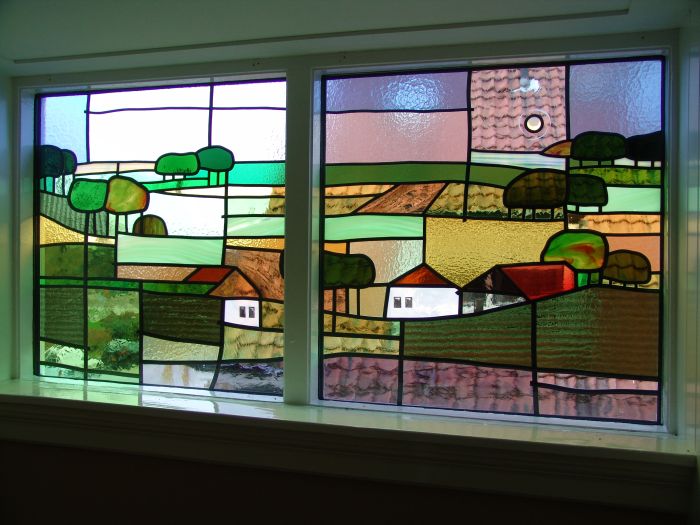 Eindresultaat glas in lood in dubbelglas in trappenhuis