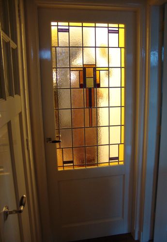 Nieuw glas in lood in tussendeur