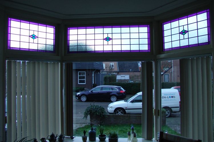Glas in lood in dubbelglas in bovenlichten