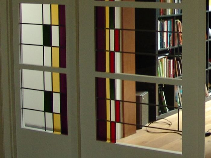 Detail glas in lood, antiekglas en floatglas