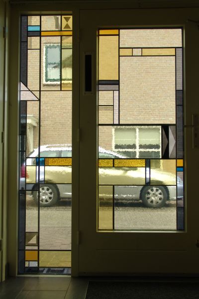 Glas in lood in dubbelglas in en naast voordeur