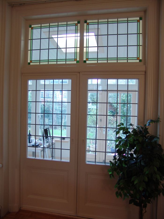 Glas in lood in kamer en suite en bovenlichten