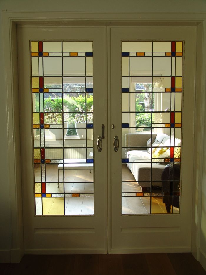 Nieuw glas in lood in kamer en suite deuren