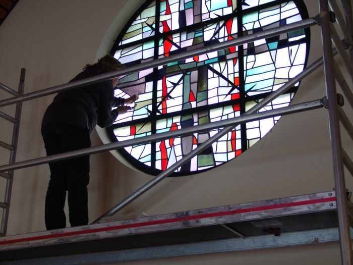 Glas in lood herstel op de steiger