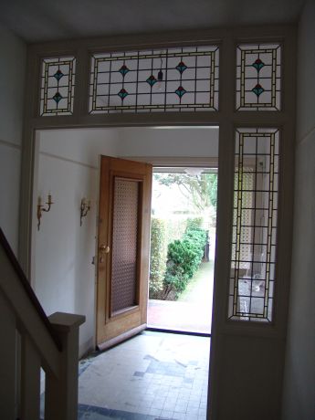Glas in lood met bloemmotief door AvD-Glas