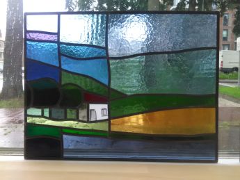 Glas in lood gepatineerd