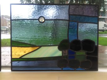 Glas in lood gepatineerd