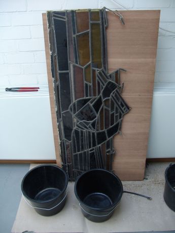 Glas in lood uit elkaar halen en reinigen