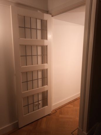 Blank glas in lood in tochtdeur