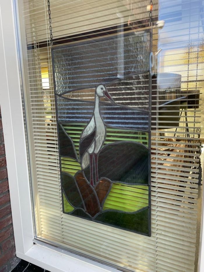 Glas in lood hanger bij de klant