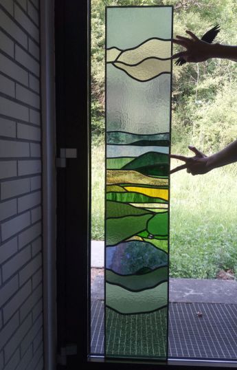 Glas in lood gesneden en proefopstelling in de werkplaats