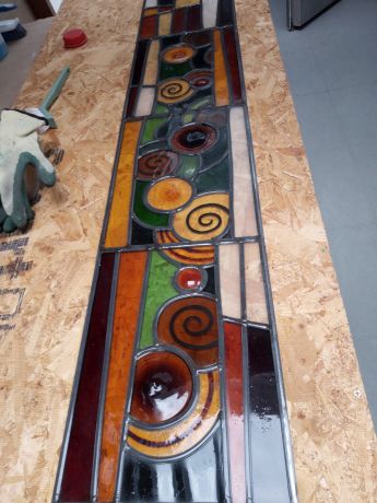 Glas in lood gepatineerd en ge&iuml;soleerd