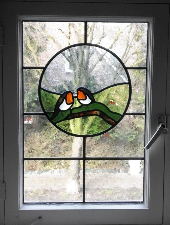 Roodborstjes in isolatieglas, Hoogland, 2017