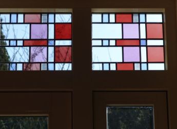 Glas in lood in bovenlichten, Baarn