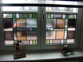 Glas in lood als voorzetramen tegen dubbelglas