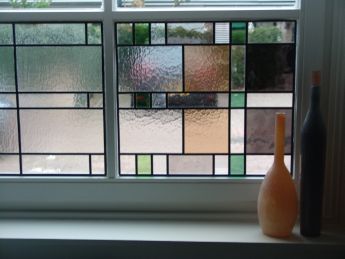 Glas in lood als voorzetramen tegen dubbelglas