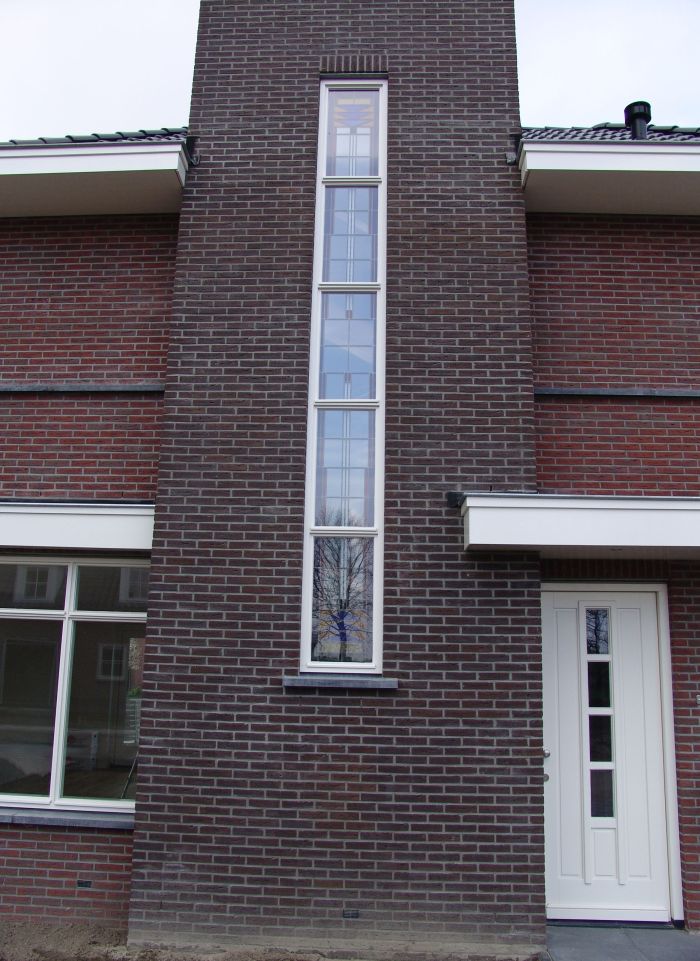 Glas in lood in trappenhuis, buitenaanzicht