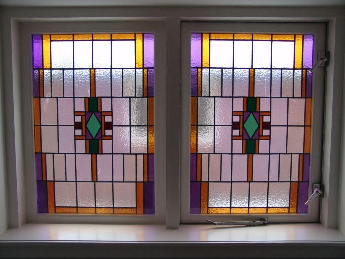 Glas in lood gerestaureerd en in dubbelglas