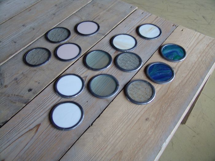 Onderzetters diverse kleuren, ca. 9cm ⌀, &euro; 4,- per stuk